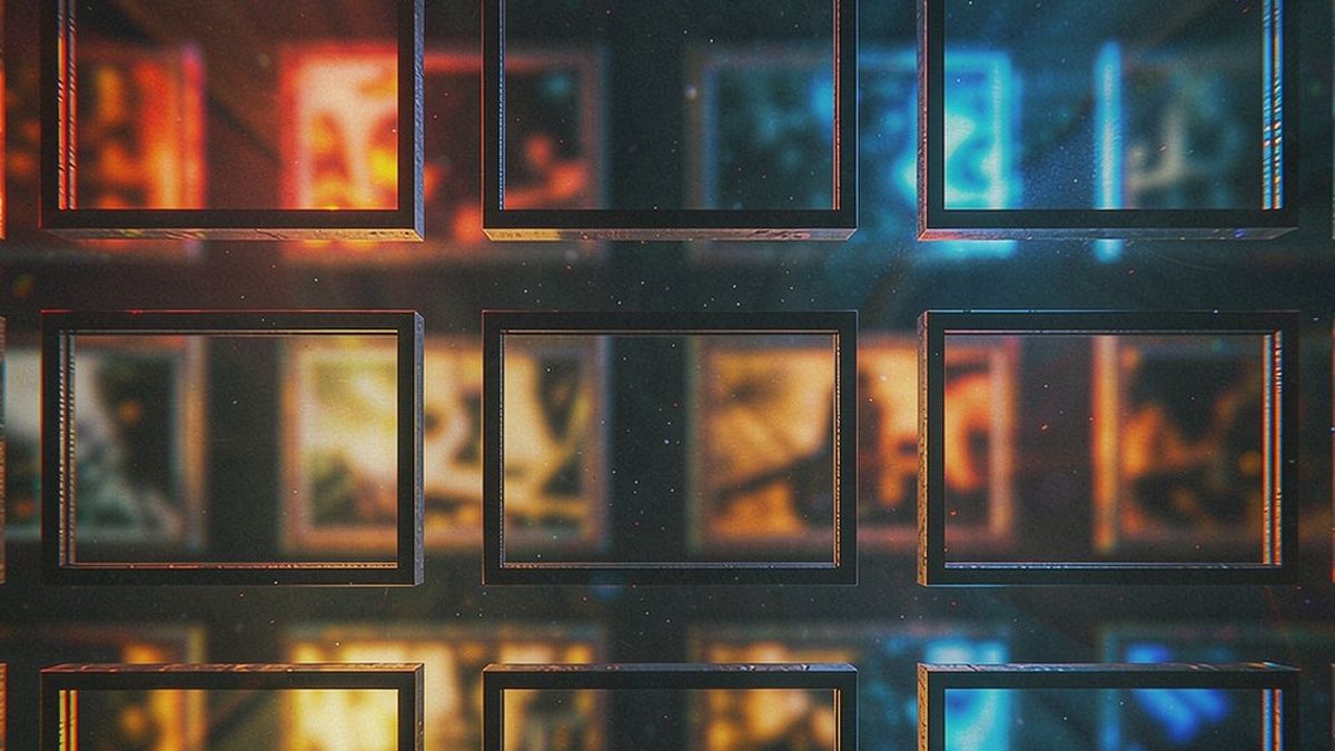 A grid of empty picture frames mounted on a dark wall